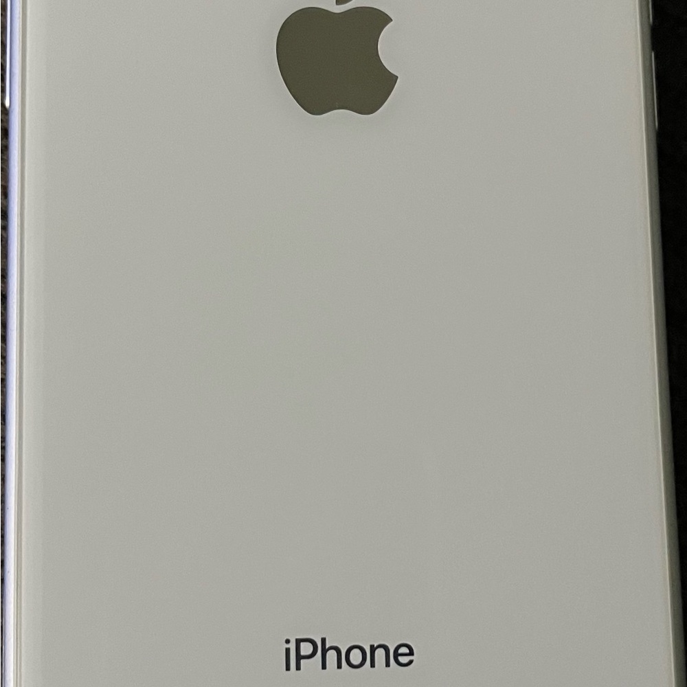 White iPhone XR 64 GB used like new. Manufactured reset